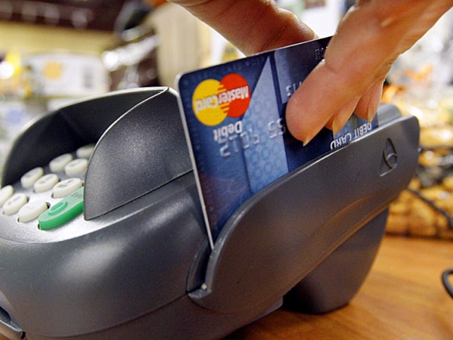 Чи поширюються готівкові обмеження на розрахунки карткою?