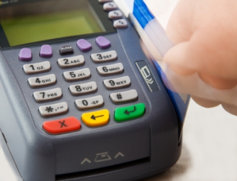 Якою датою визнавати дохід платника ЄП при розрахунку платіжною карткою?